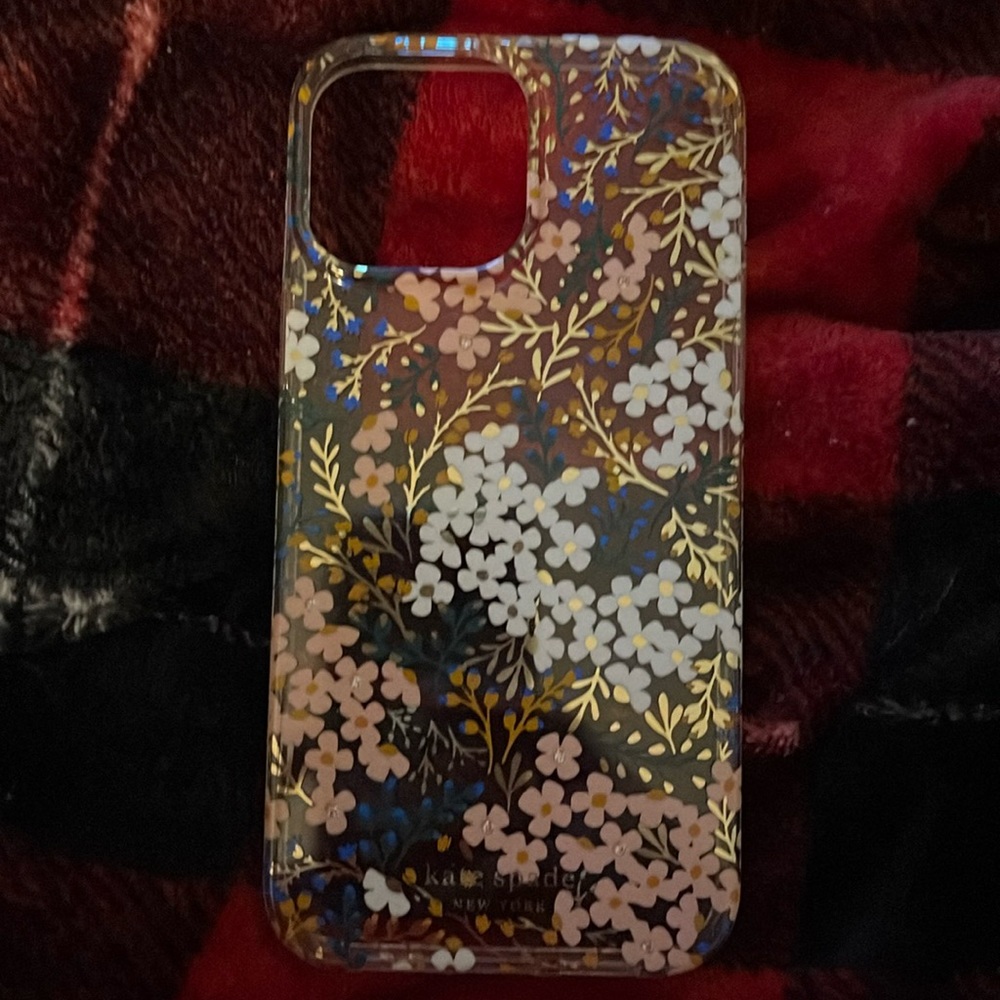 Kate spade floral case. Never used it. No box